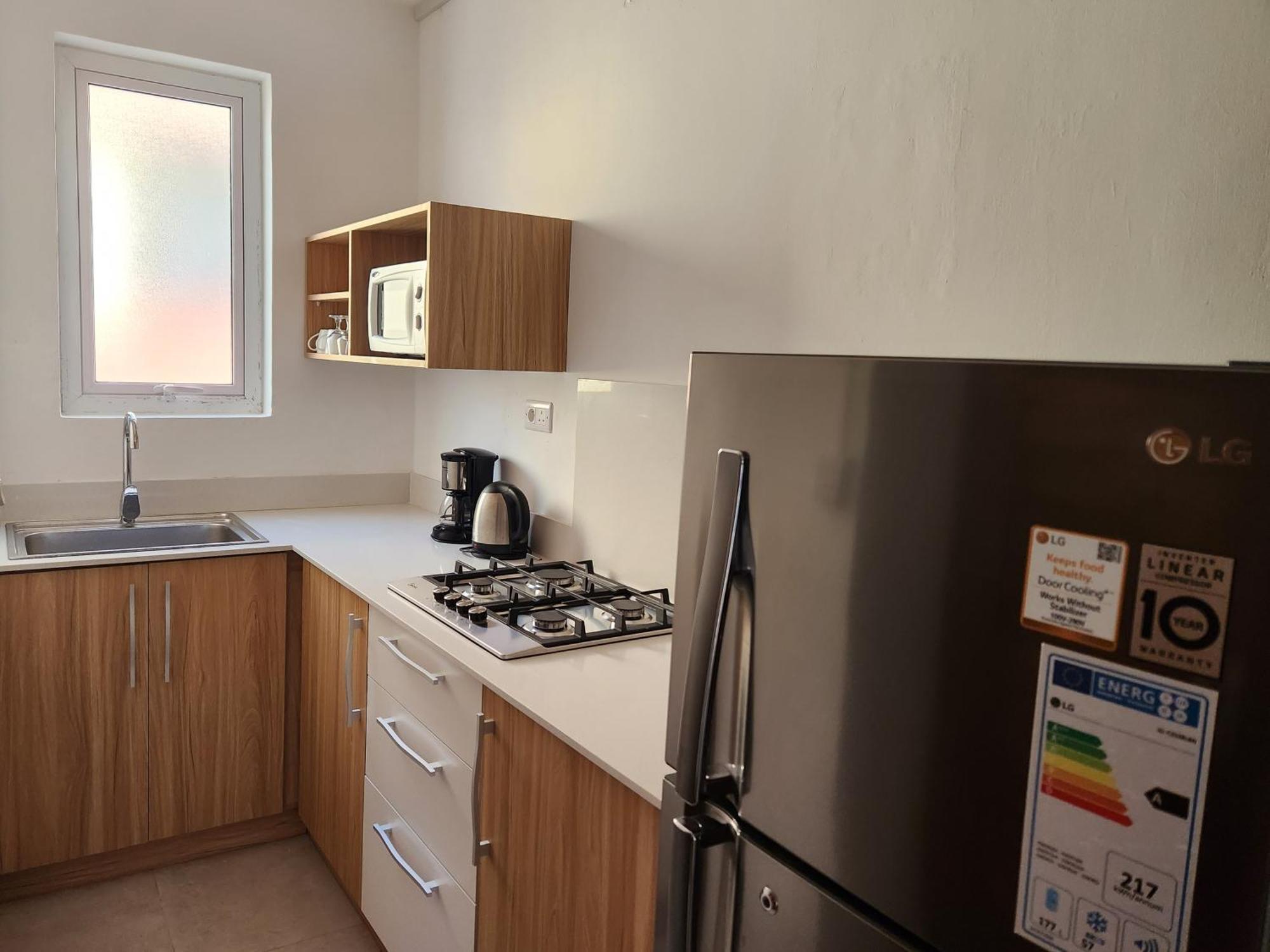 La Perla Holiday Apartments Pereybere Beach Номер фото